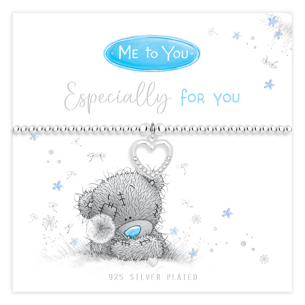 Silver bracelet with a teddy bear charm on a 'Me to You' branded card.