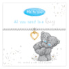 Silver bracelet with gold heart charm and Me to You bear on a white background