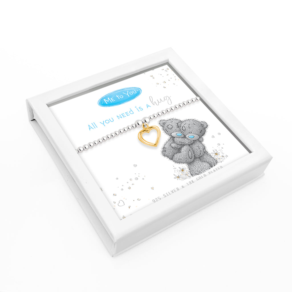 A Me to You gift box containing a silver chain bracelet with a gold heart charm and a blue 'Me to You' logo, displayed on a white background.