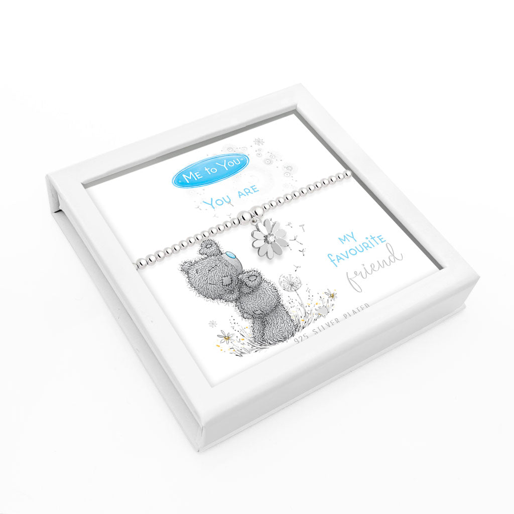 Jewellery box with a bear illustration and text in a white box on a white background