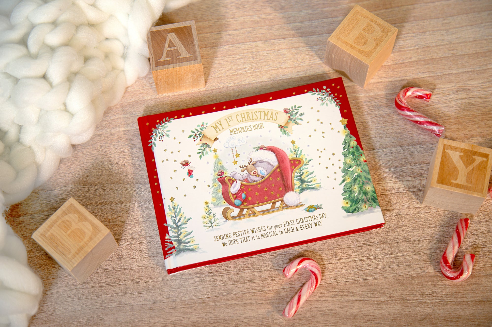 My 1st Christmas Memories book with Tiny Tatty Teddy festive artwork in a lifestyle nursery scene.