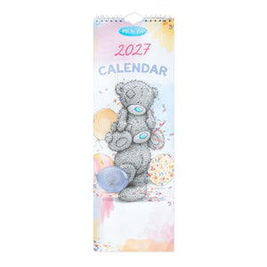 A Me To You 2027 spiral-bound wall calendar featuring a gray teddy bear illustration with pastel watercolor accents on a white background.